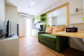 Connect to Pool 2BR Apartment at Bassura City By Travelio